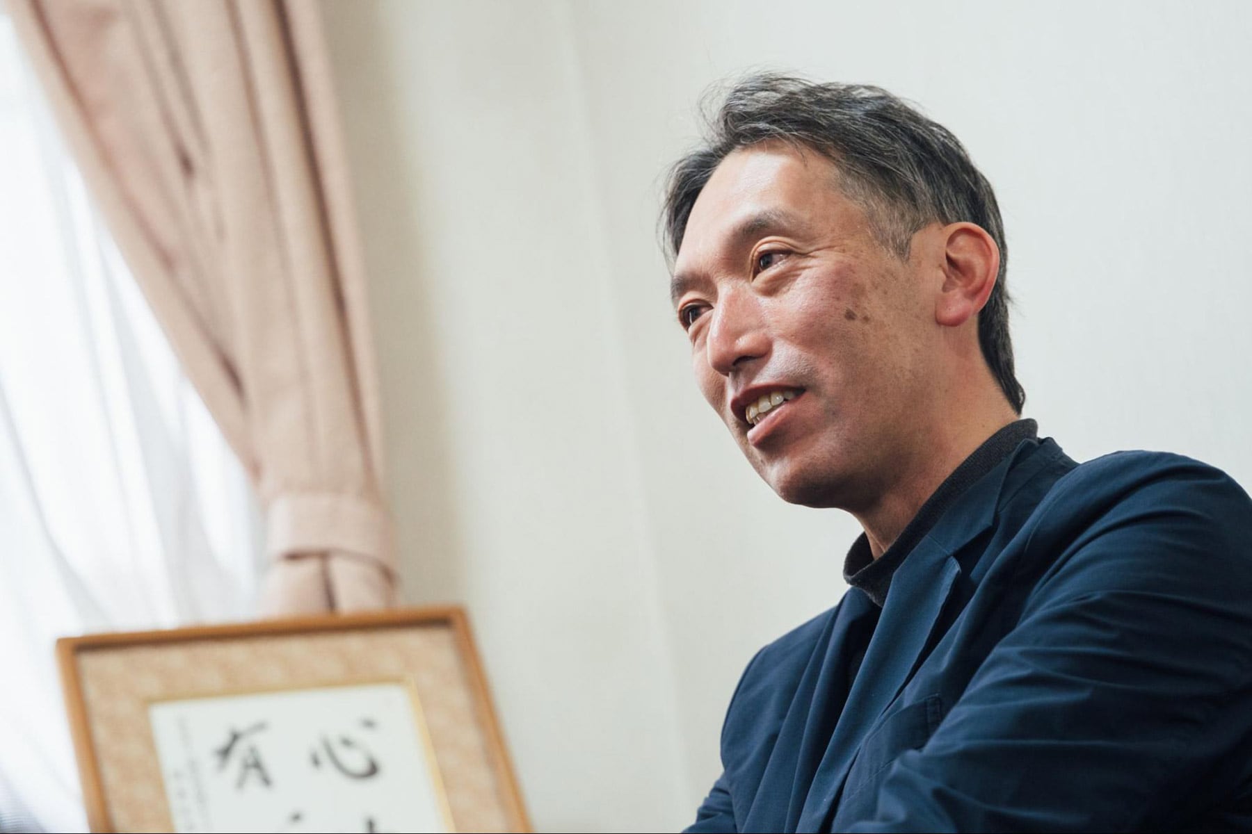 笑顔で話す伊吾田さん